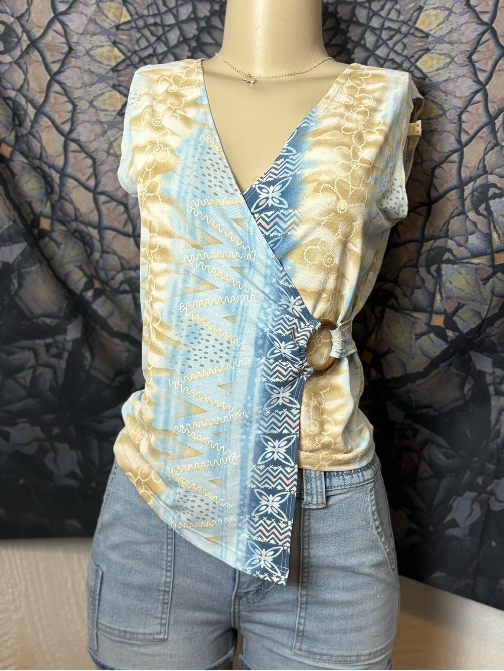 Sleeveless Wrap-Style Top in Light Blue and Beige